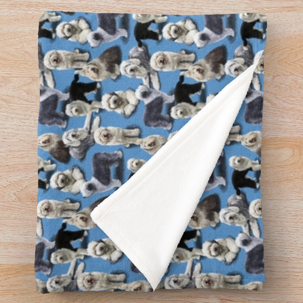 Soft and cuddly plush blanket featuring an adorable old english sheepdog