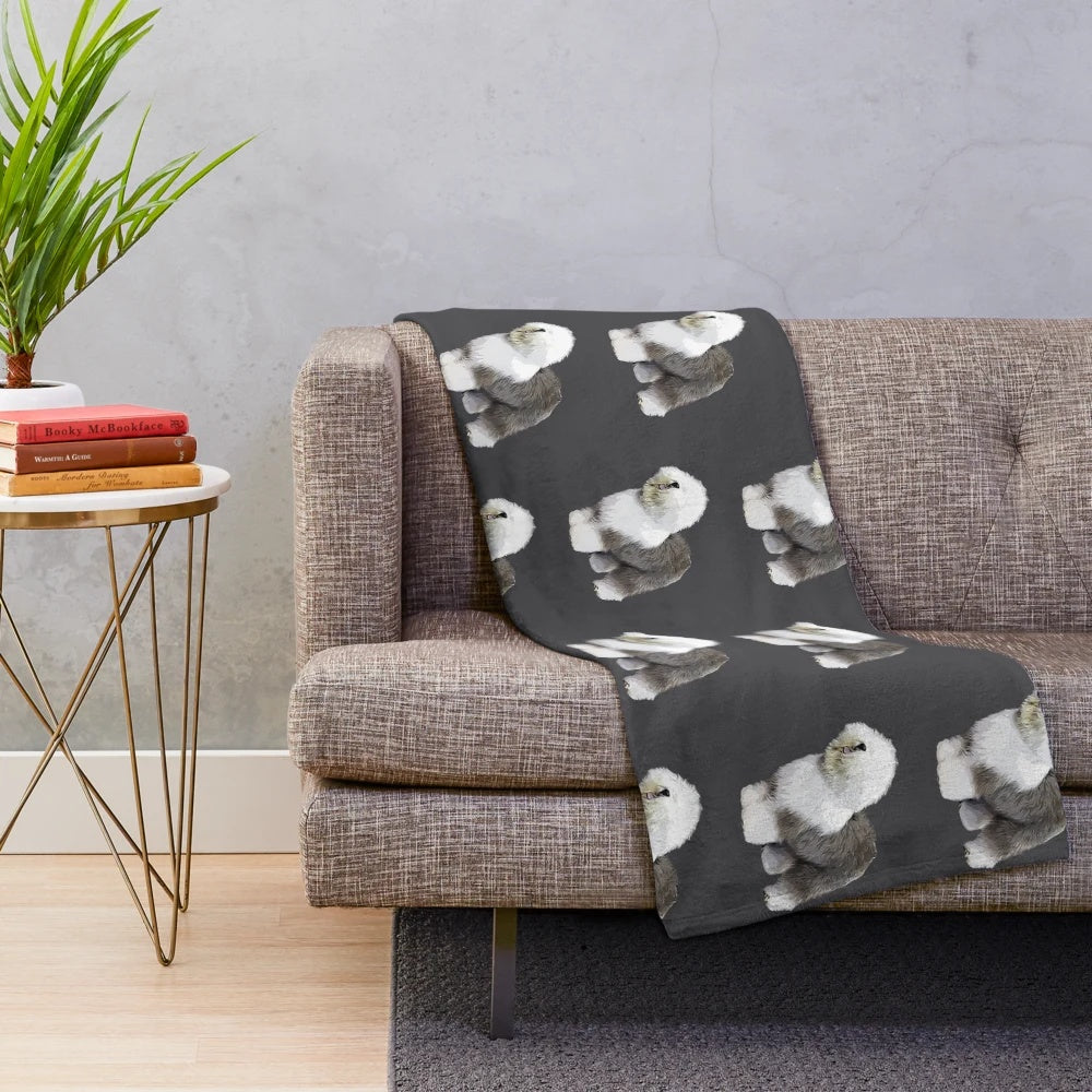 Soft, plush blanket featuring a cute old English sheepdog design