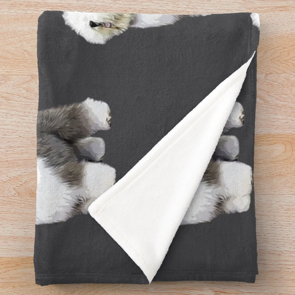 Soft, plush blanket featuring a cute old English sheepdog design