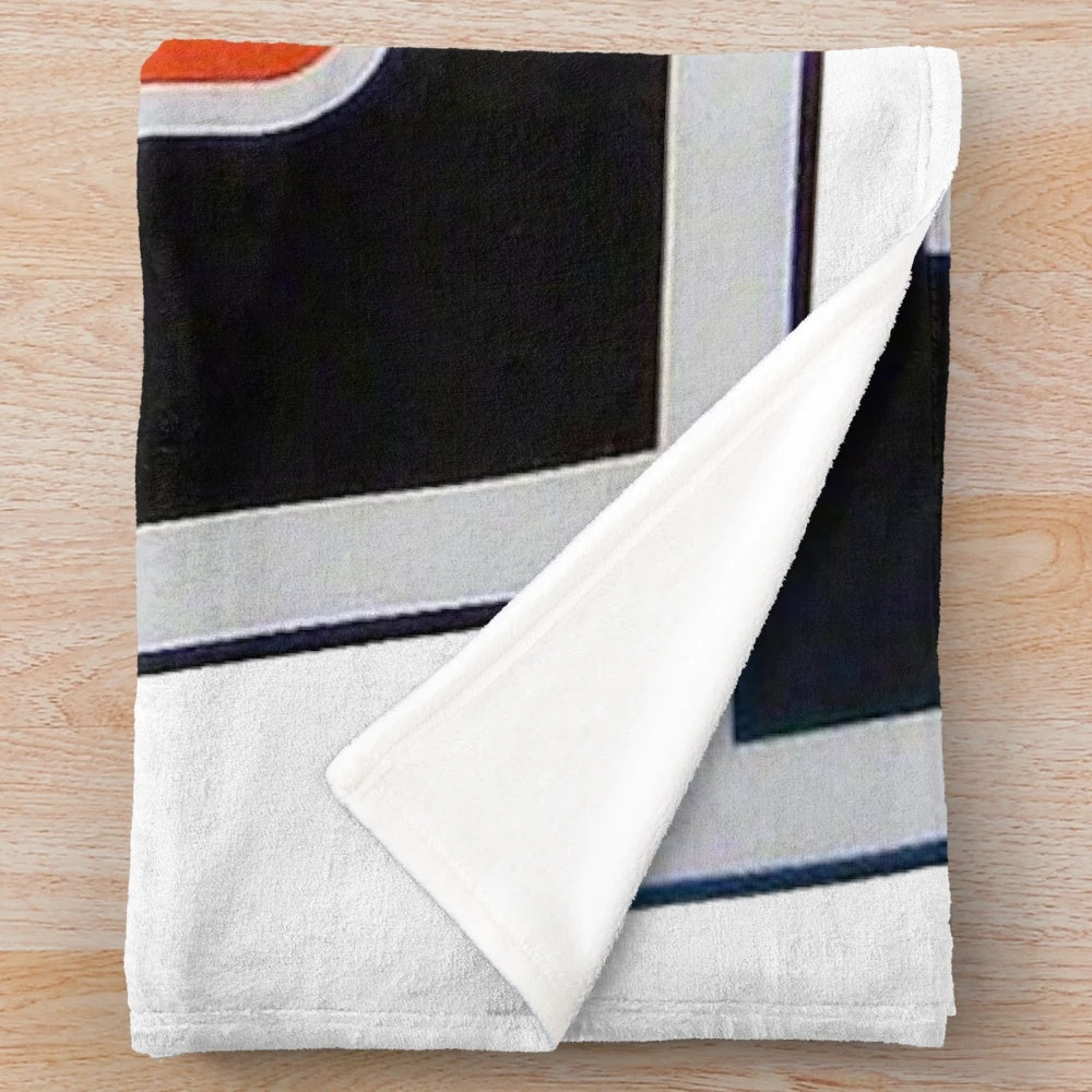 Oliver Tractor Keystone Plush Blanket featuring a detailed tractor design