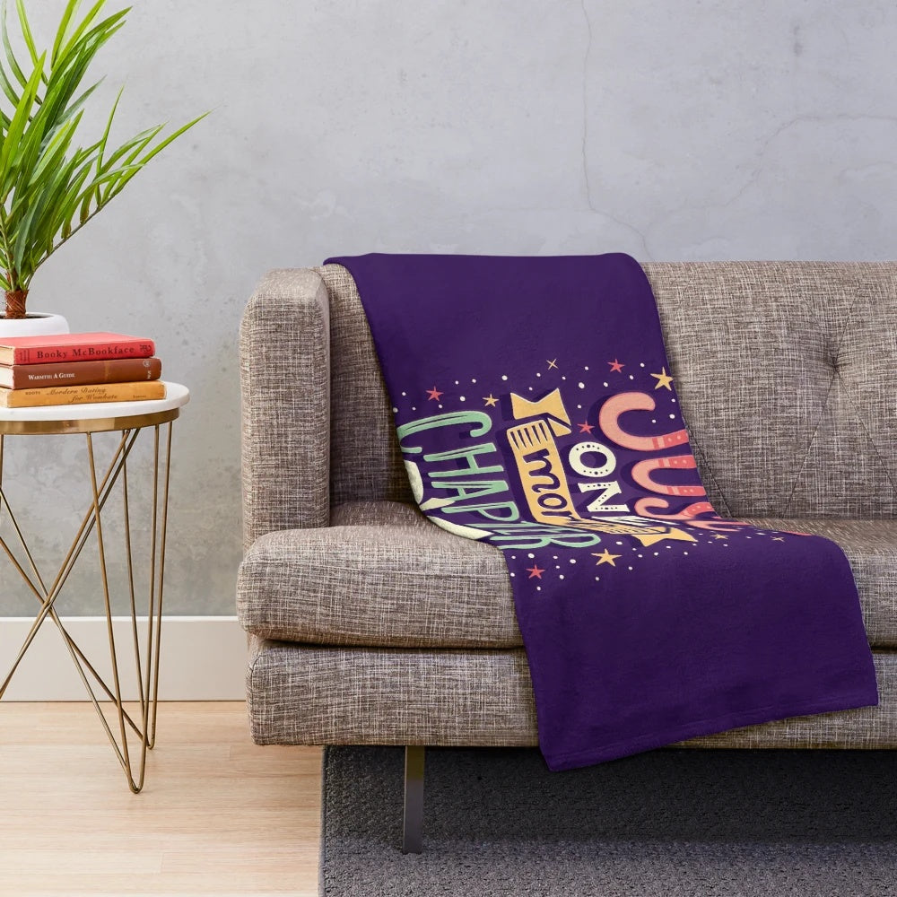 Cozy plush blanket with "One More Chapter" design for book lovers and reading enthusiasts