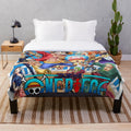 One Piece-inspired plush blanket featuring characters from the popular anime/manga series
