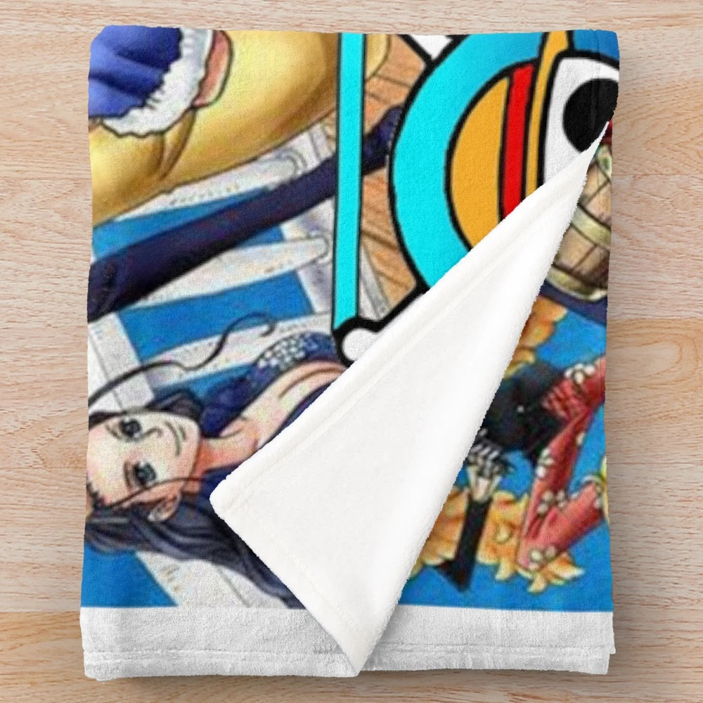 One Piece-inspired plush blanket featuring characters from the popular anime/manga series