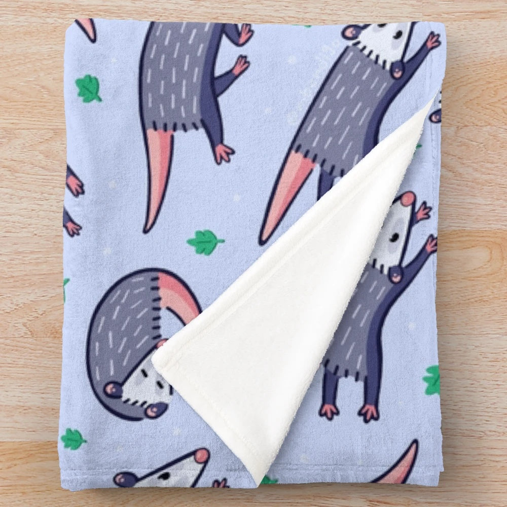 Soft and plush opossum pattern blanket