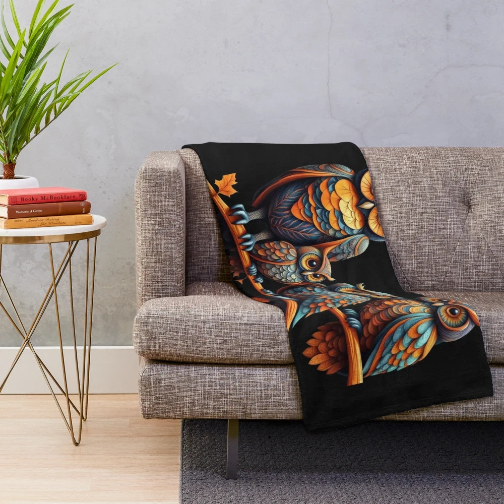 Soft, colorful orange and blue plush blanket featuring autumn owls