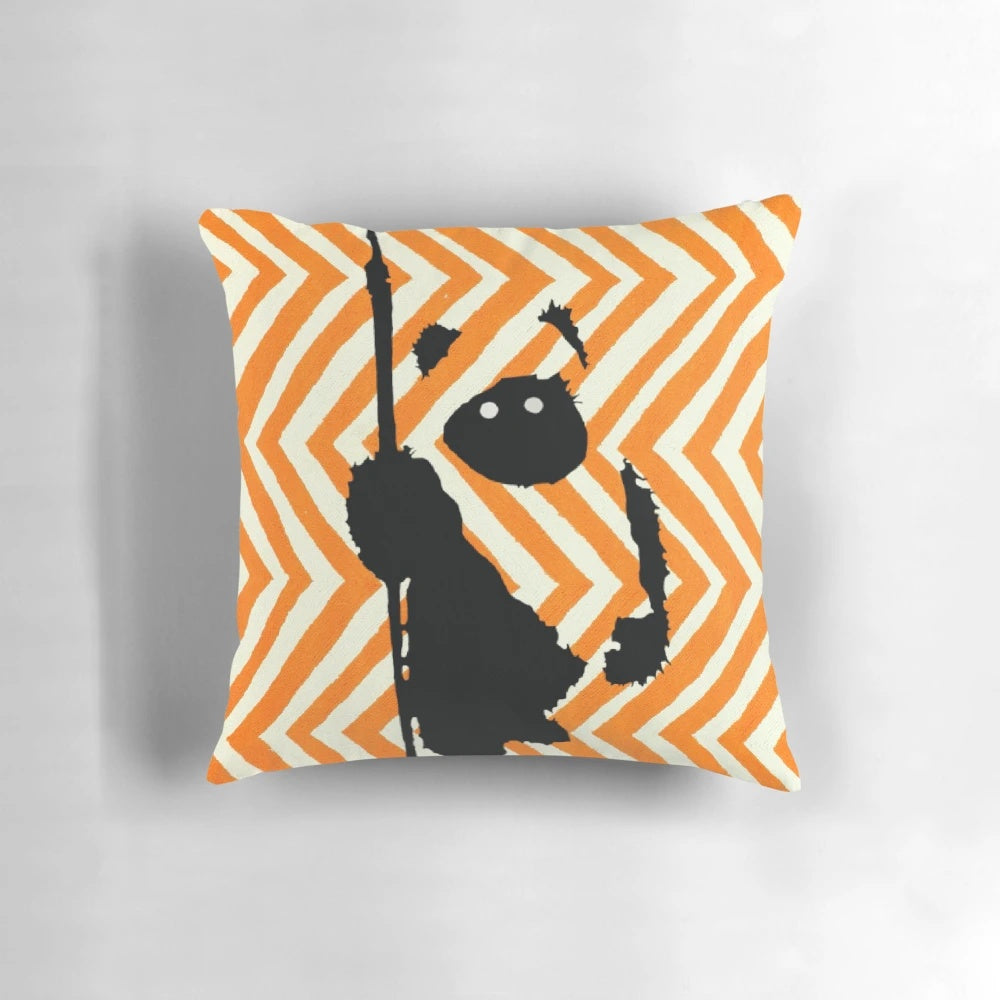 Orange and white chevron patterned plush pillow with a cute bear-like silhouette design