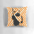 Orange and white chevron patterned plush pillow with a cute bear-like silhouette design
