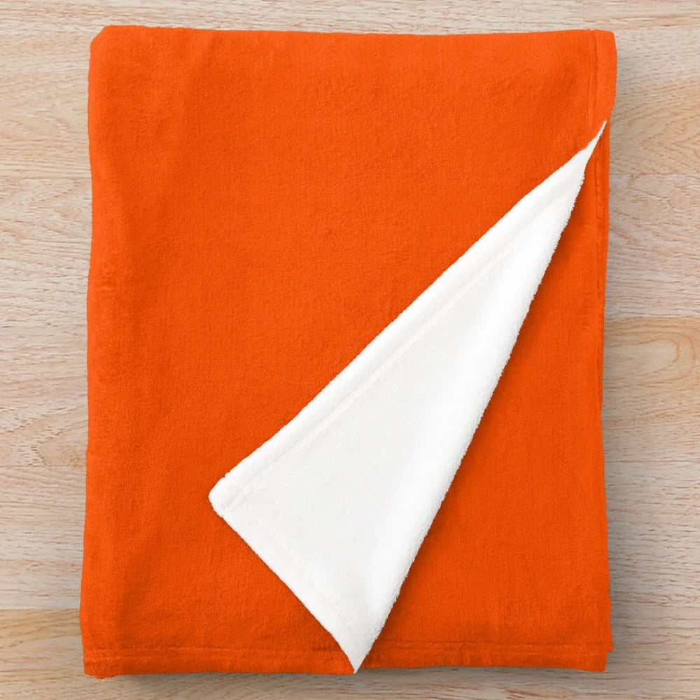 Orange plush blanket for cozy autumn snuggles
