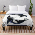 Orca plush blanket with black and white design