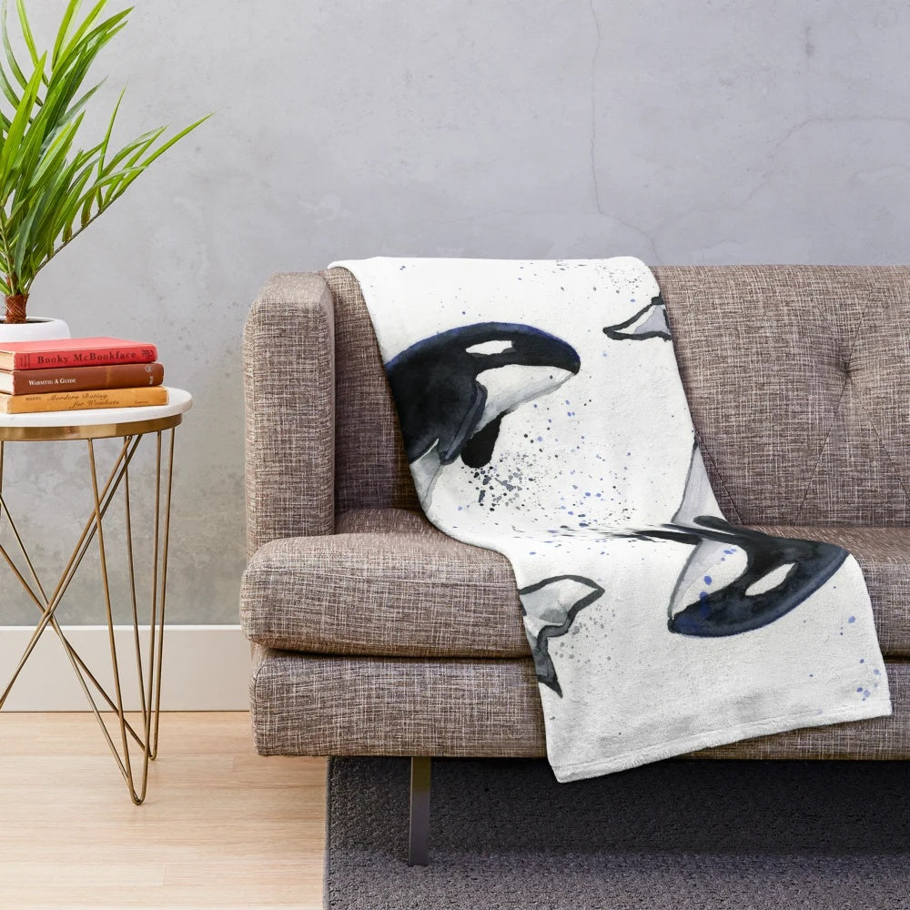 Orca plush blanket with black and white design
