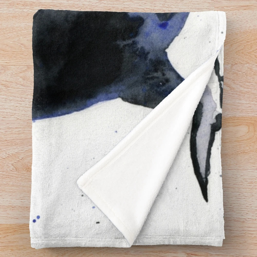 Orca plush blanket with black and white design