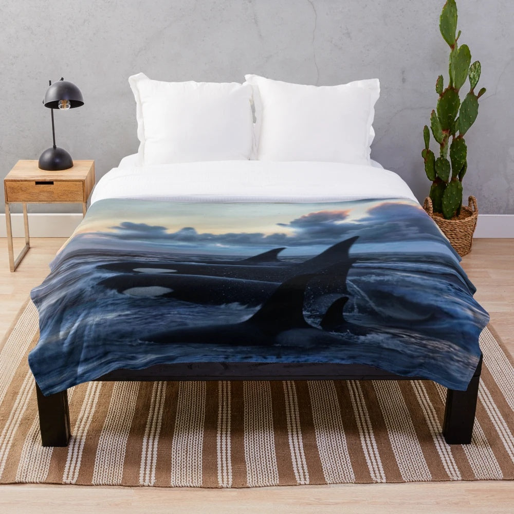 Orca plush blanket featuring a beautiful ocean sunset design