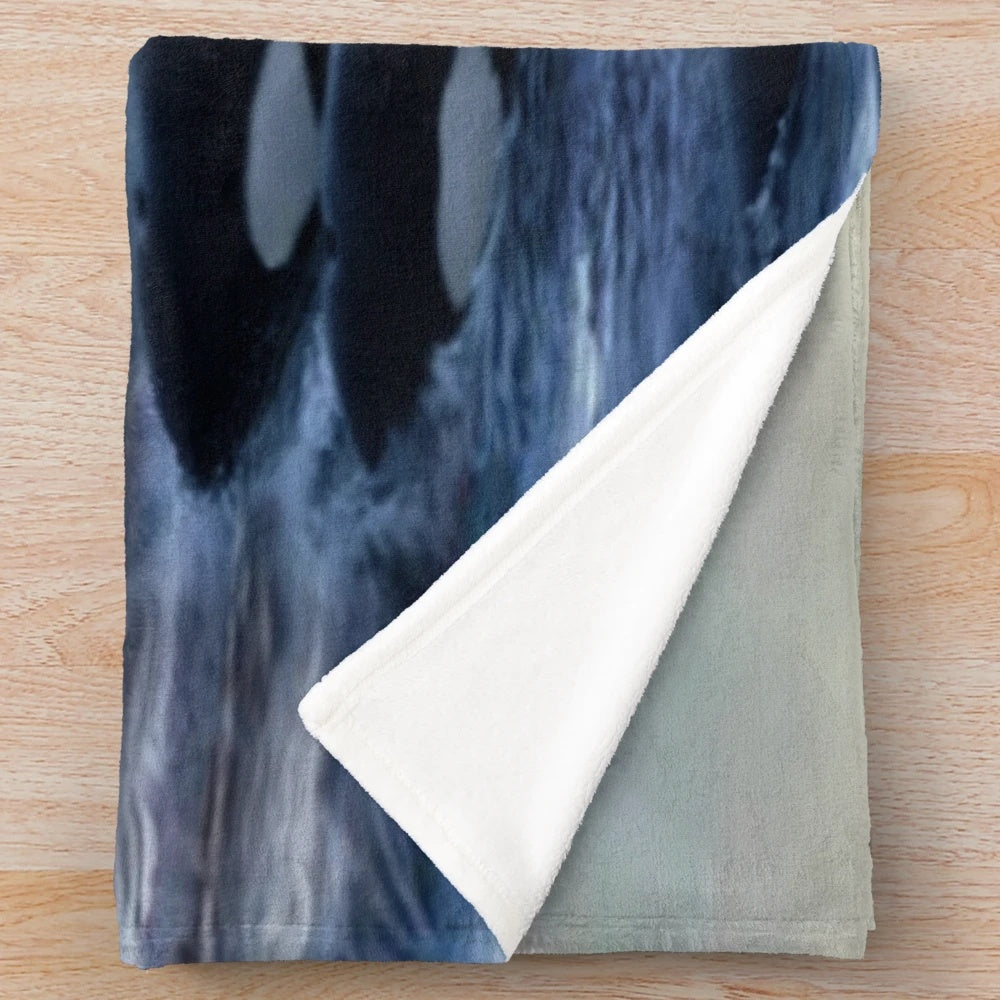 Orca plush blanket featuring a beautiful ocean sunset design