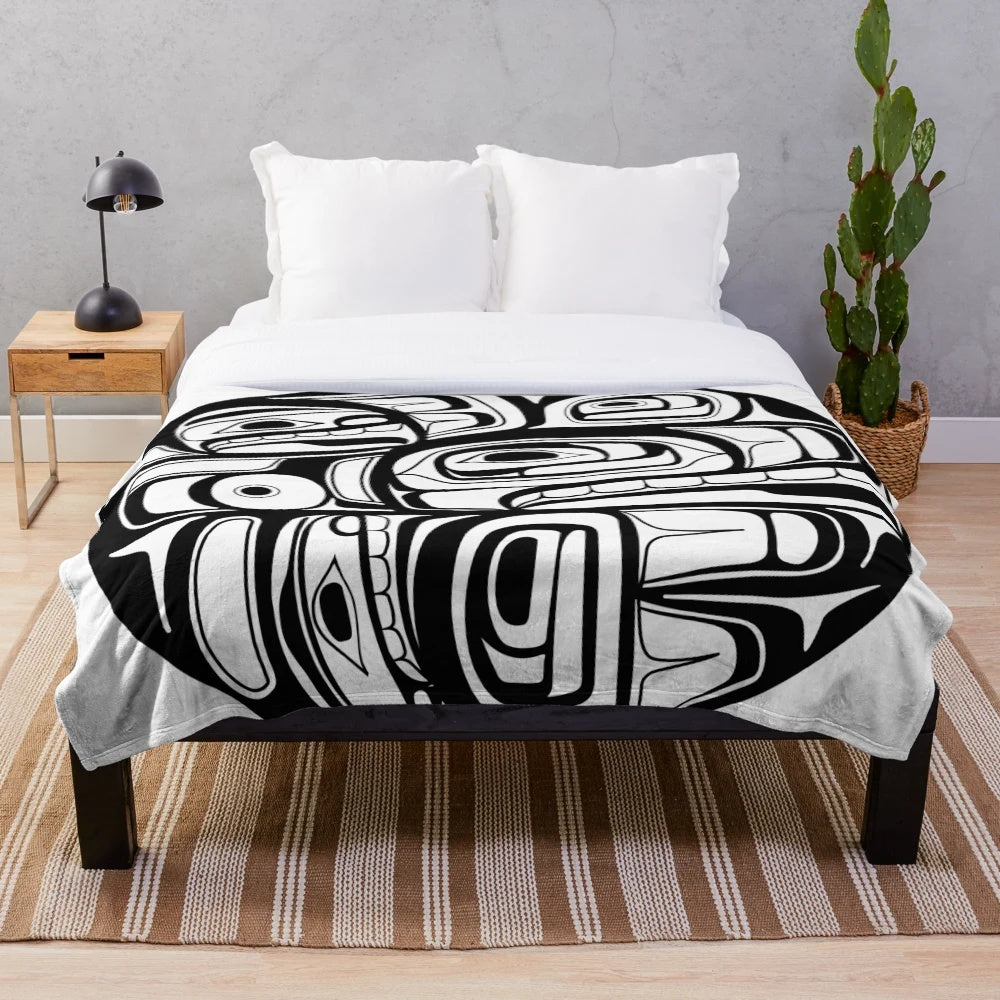 Soft and plush orca-themed blanket with native american style circle formline design