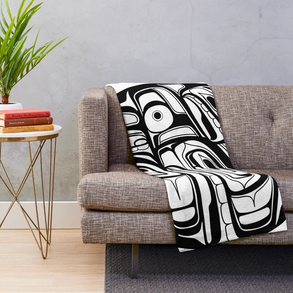 Soft and plush orca-themed blanket with native american style circle formline design