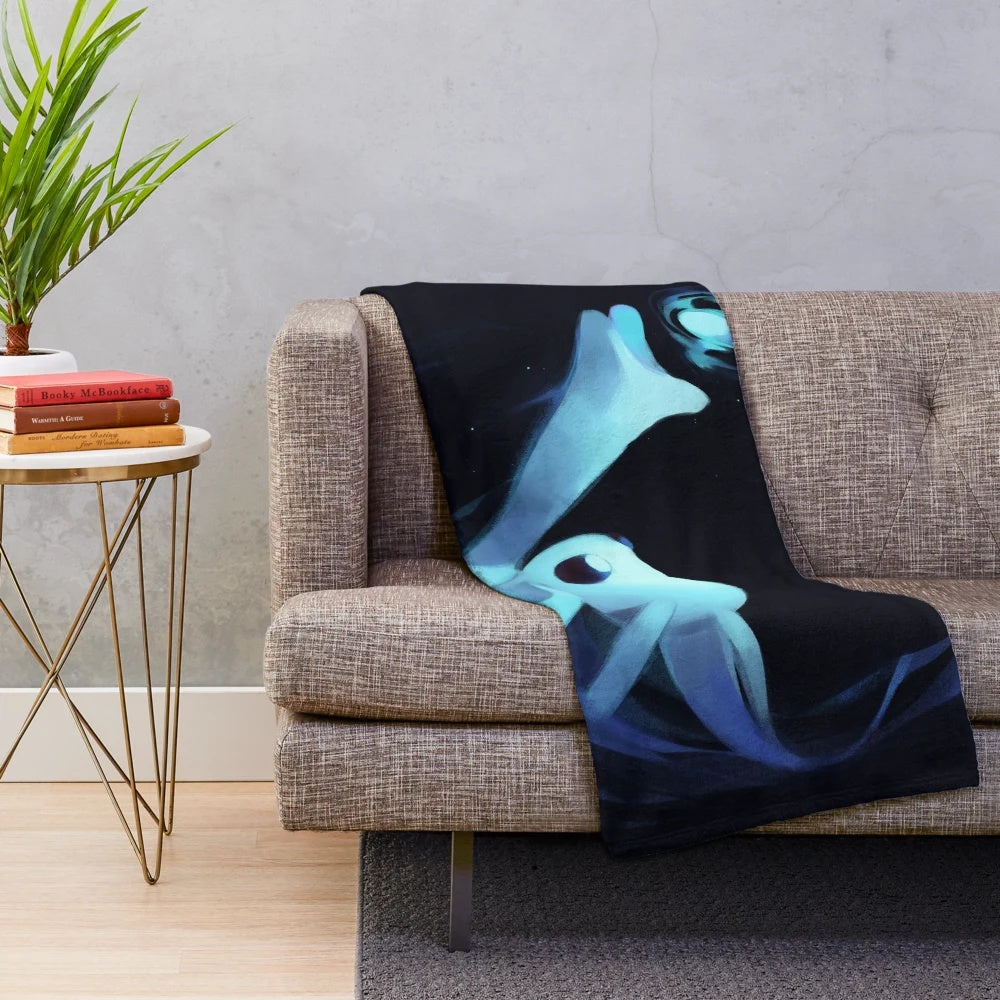 Soft and cuddly plush blanket featuring the character Ori from the video game Ori and the Blind Forest