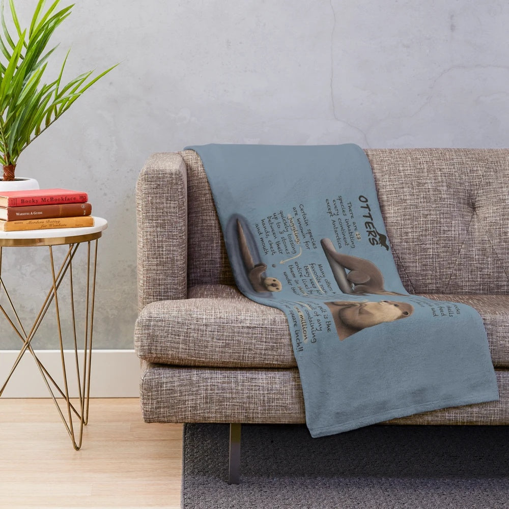 Otter plush blanket featuring fun facts about otters
