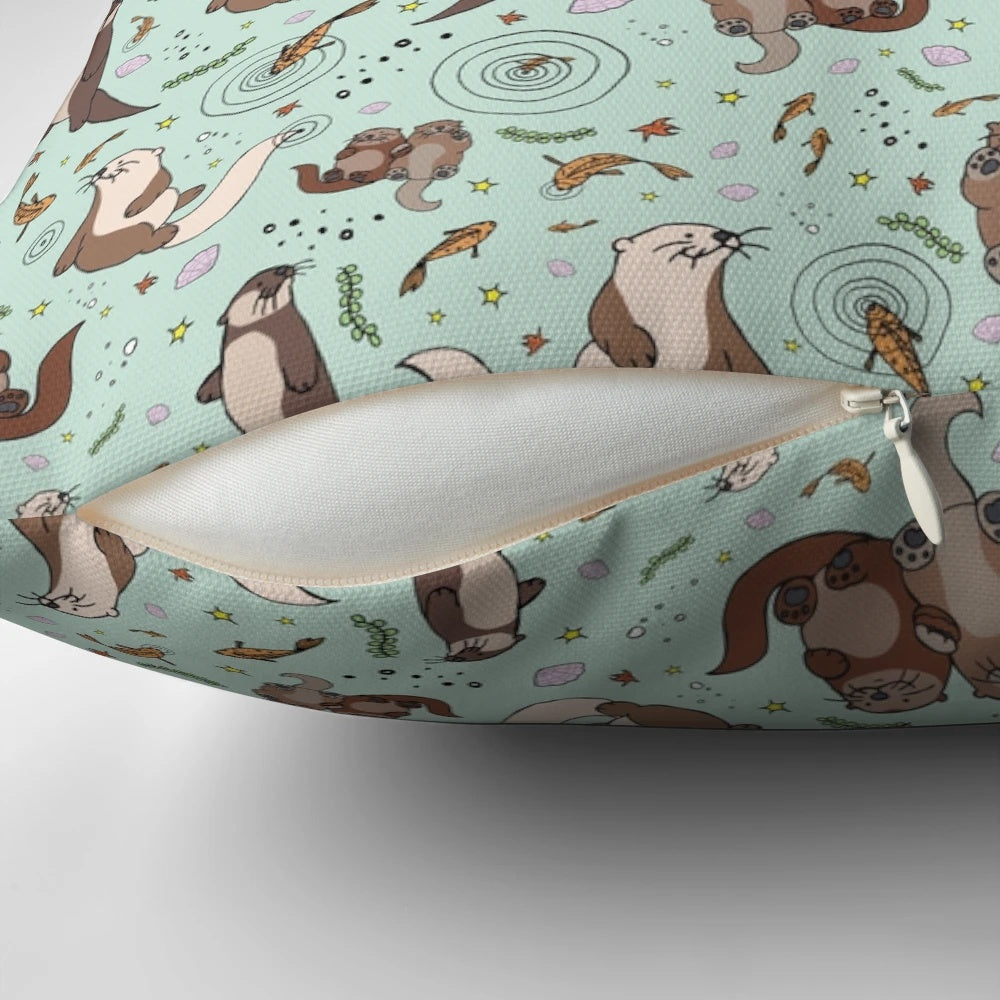 A soft, plush pillow featuring a cute and cozy sea otter design, perfect for otter enthusiasts.