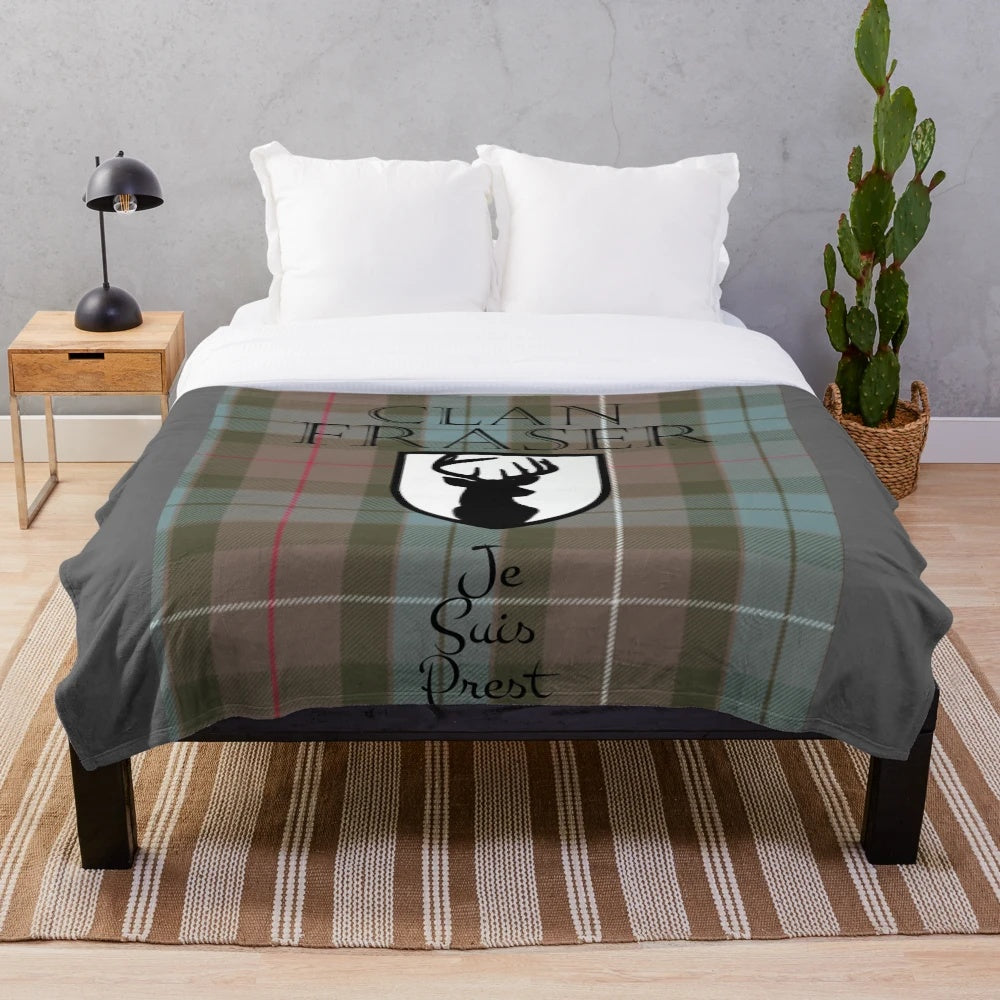 Outlander-themed plush blanket featuring the Clan Fraser tartan and imagery from the popular book and TV series