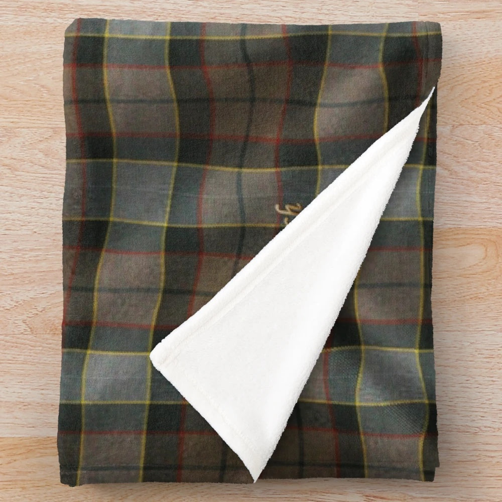 Outlander-inspired plush blanket with sassenach tartan design
