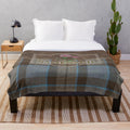 Outlander-inspired plush blanket featuring tartan, thistles, and leaves