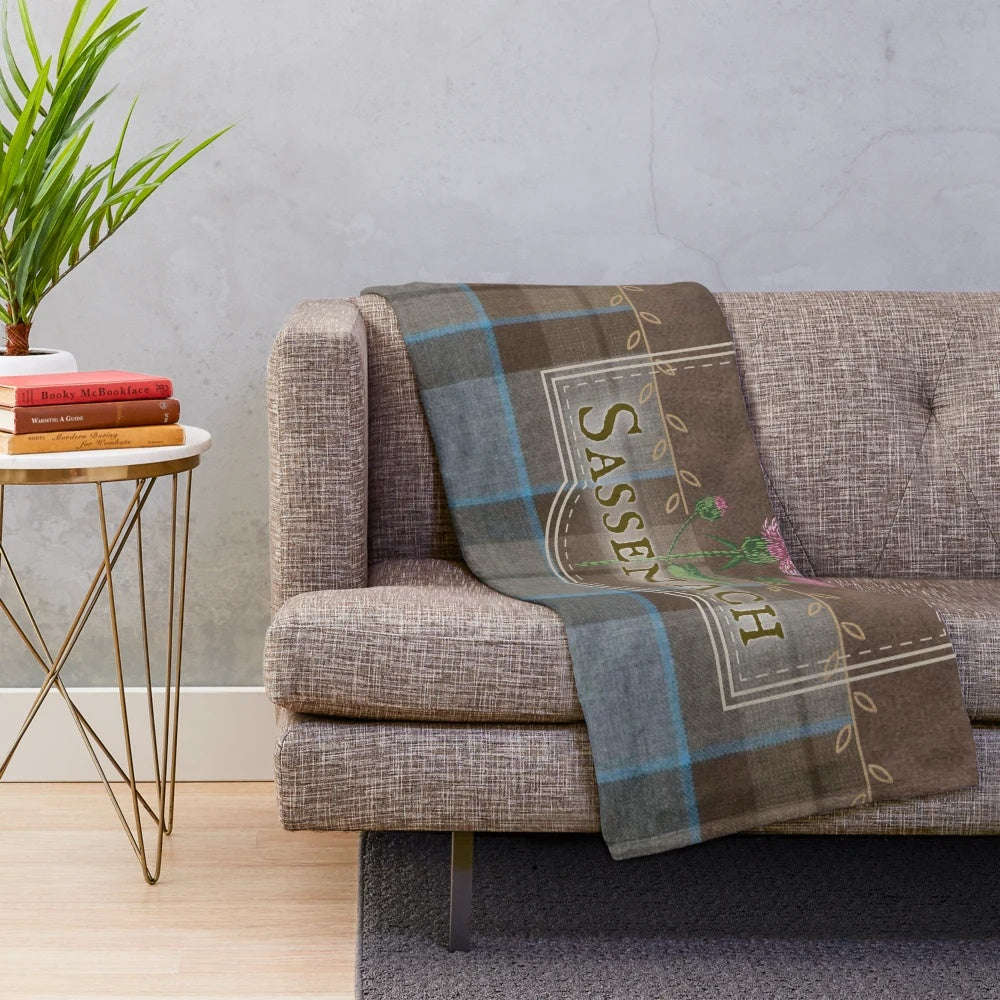 Outlander-inspired plush blanket featuring tartan, thistles, and leaves