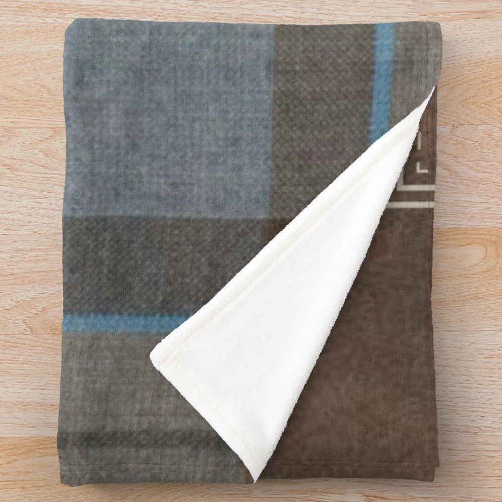 Outlander-inspired plush blanket featuring tartan, thistles, and leaves
