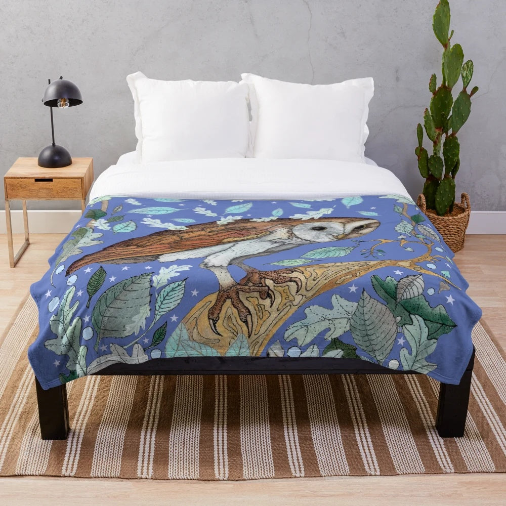 Soft and plush owl-themed blanket with botanical and moon motifs