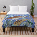 Soft and plush owl-themed blanket with botanical and moon motifs