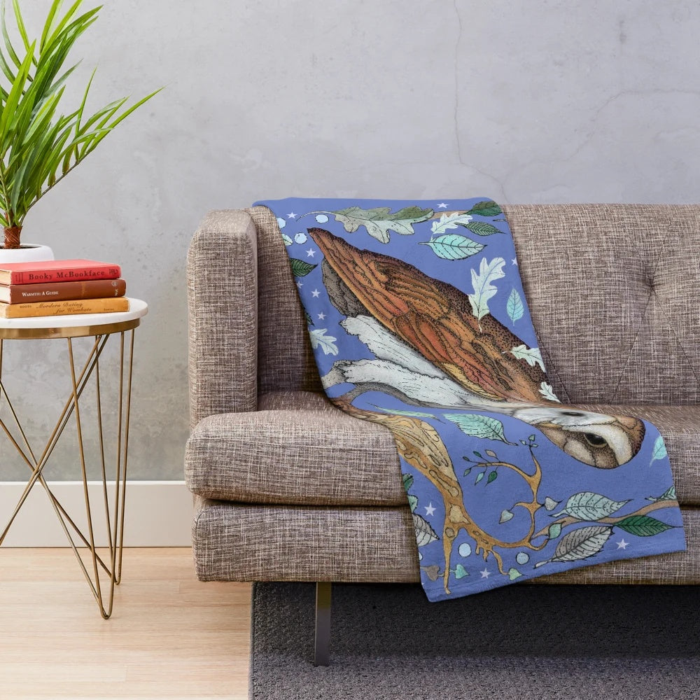 Soft and plush owl-themed blanket with botanical and moon motifs