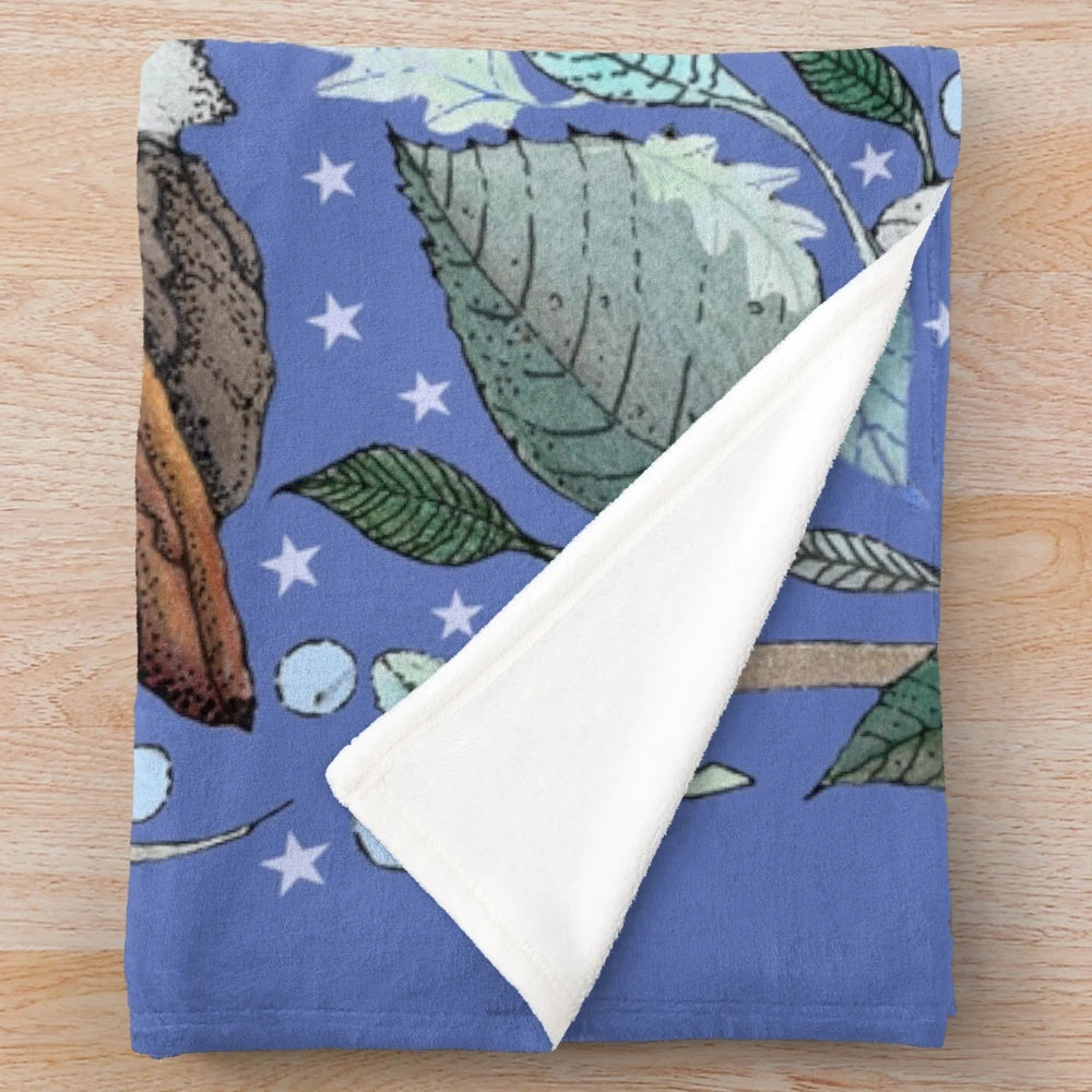 Soft and plush owl-themed blanket with botanical and moon motifs