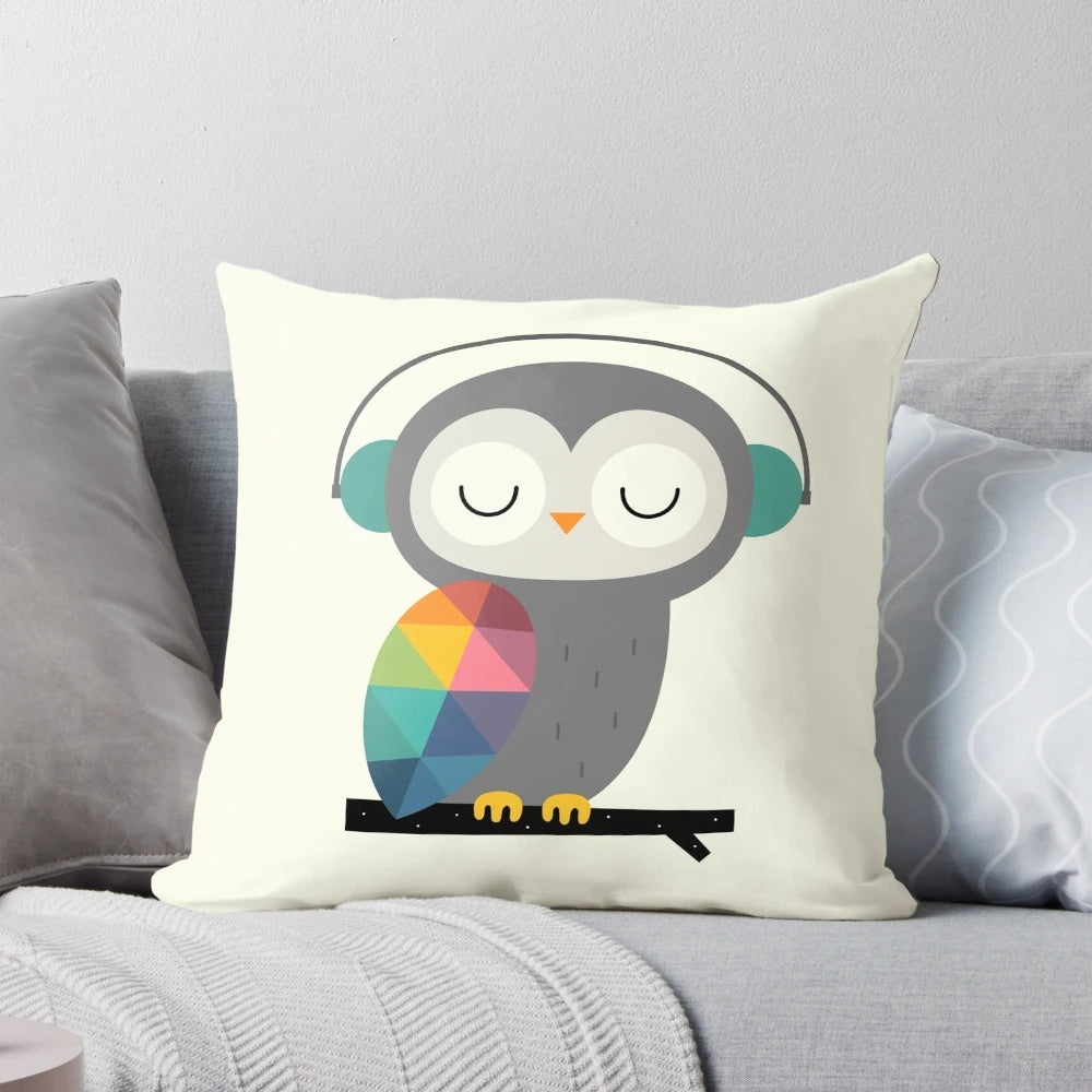Soft, plush owl-themed pillow in a whimsical rainbow design, perfect for kids' rooms or home decor.