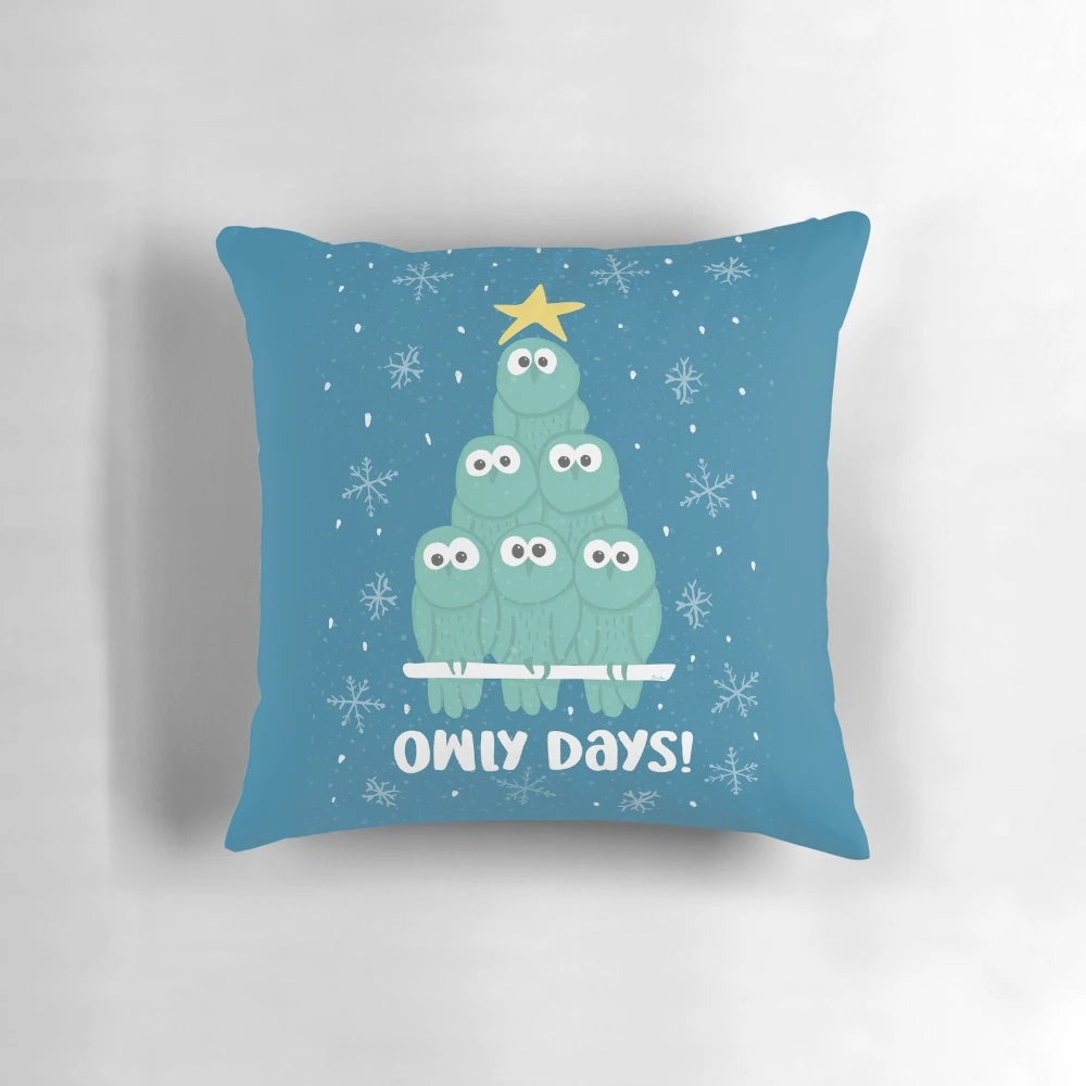 A plush, decorative pillow featuring a group of adorable owls in a winter scene
