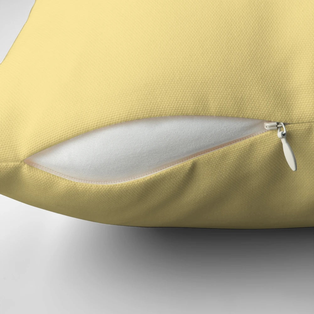 Pale yellow solid color pillow for home or living room decor