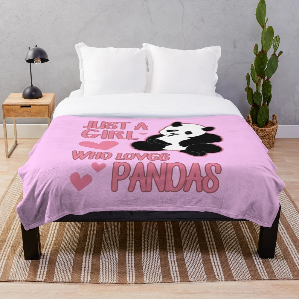 Soft and cuddly panda plush blanket with a cute panda design