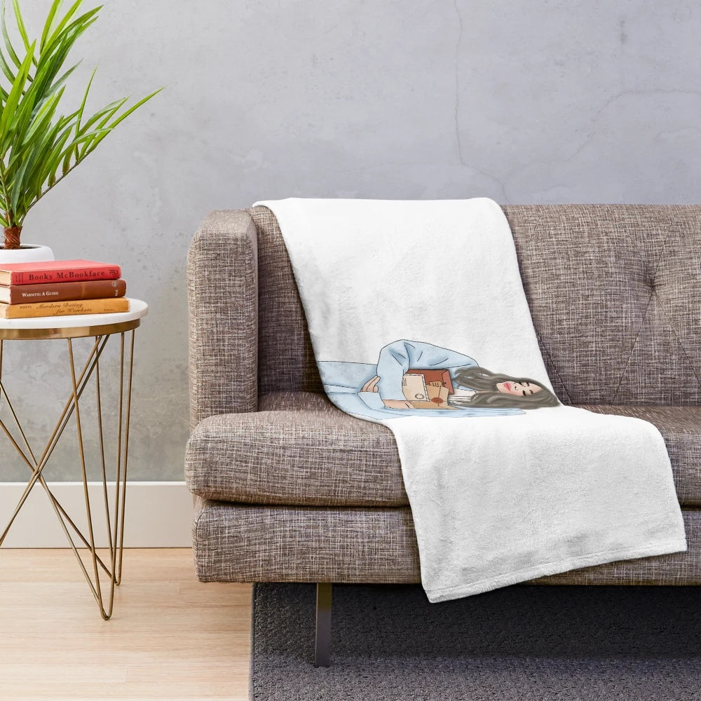 Plush blanket with paper-inspired design and red-haired girl