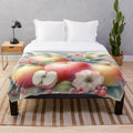 Cozy pastel watercolor painting of fall apples and flowers on a plush blanket