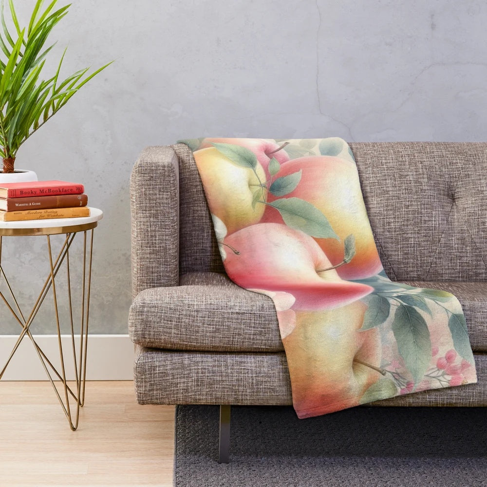 Cozy pastel watercolor painting of fall apples and flowers on a plush blanket