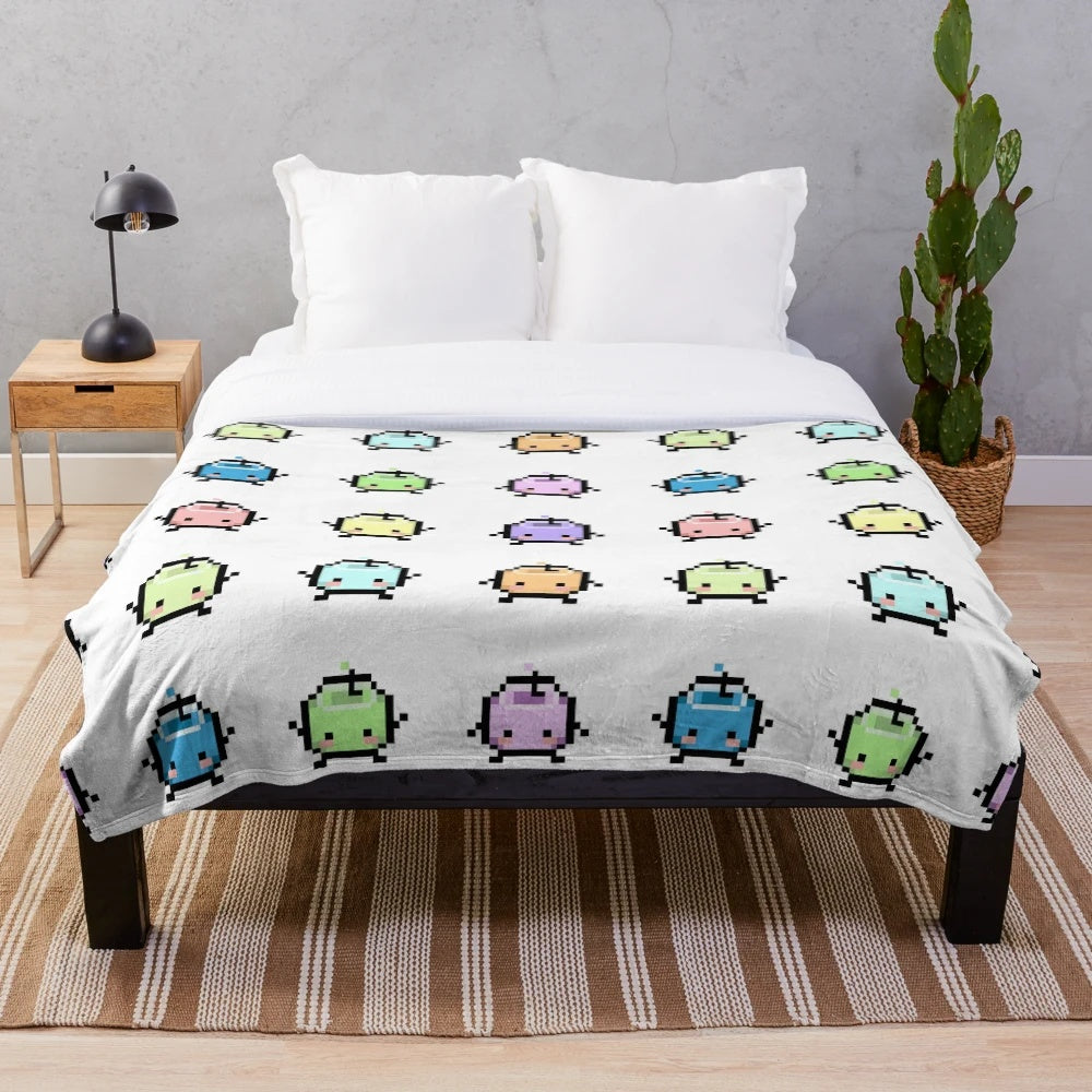 Pastel Junimos plush blanket featuring pixel art from the game Stardew Valley