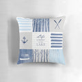 Patchwork pillow with lake, cabin, and water sports design