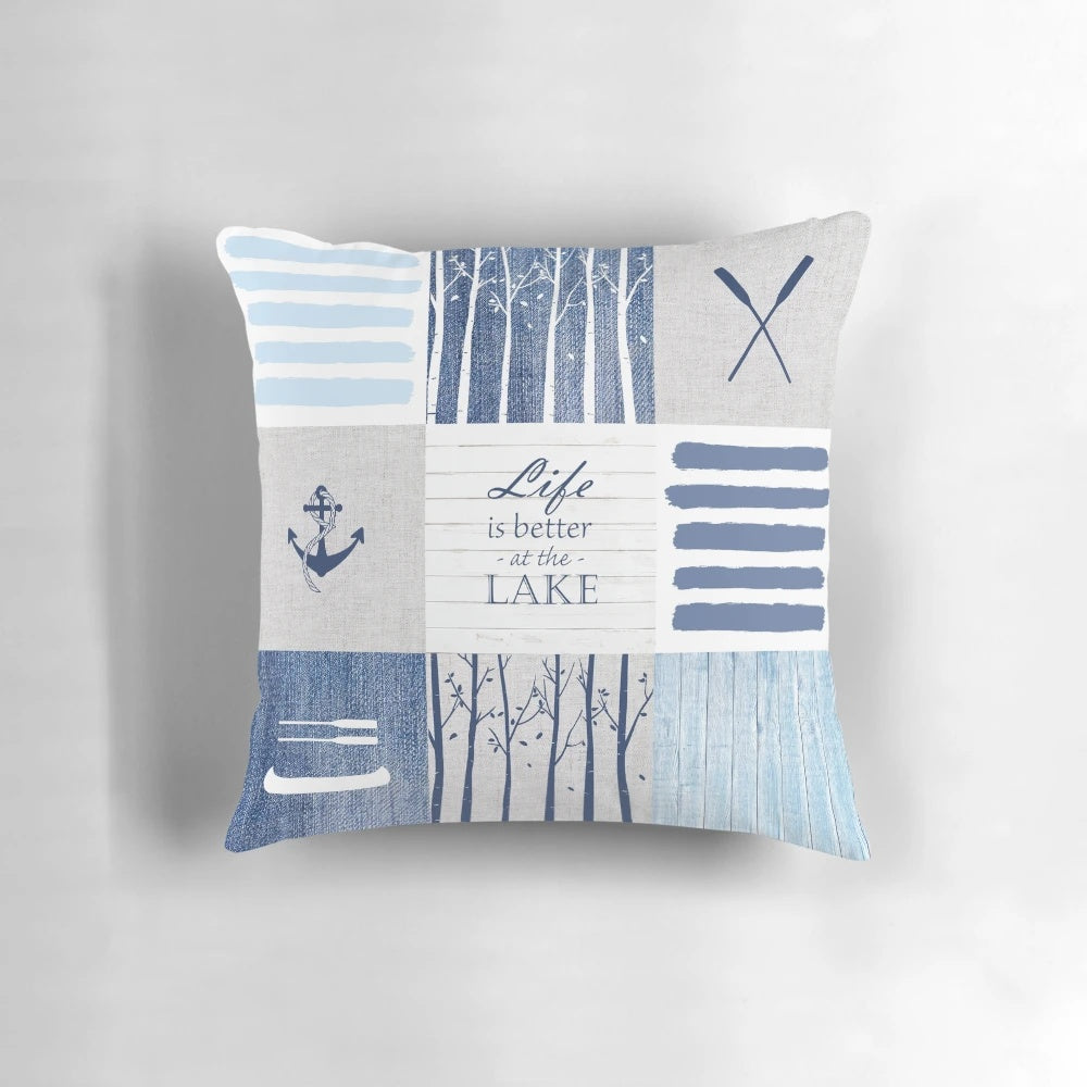Patchwork pillow with lake, cabin, and water sports design
