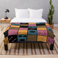 Cozy patchwork plush blanket with a spooky Nightmare Sally inspired pattern