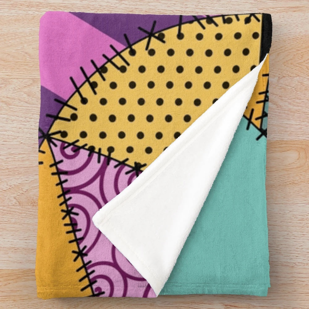 Cozy patchwork Sally ragdoll plush blanket featuring stitched design inspired by The Nightmare Before Christmas