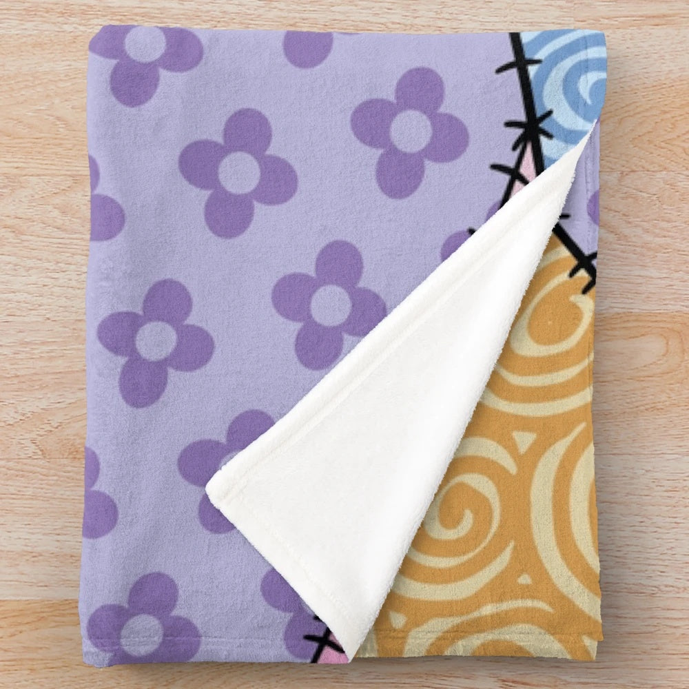 Colorful patchwork throw blanket with star and floral patterns