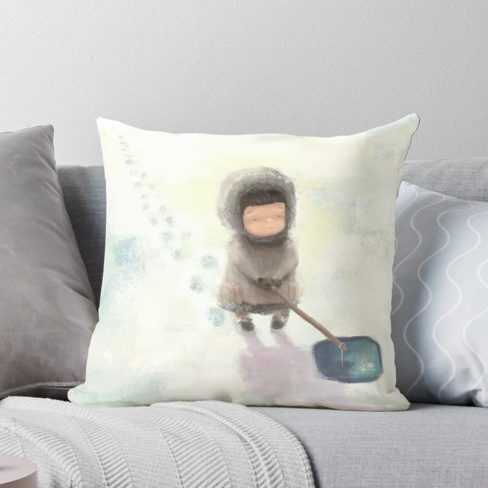 Patience Pillow featuring an illustration of Inuit children fishing in a snowy, Arctic landscape