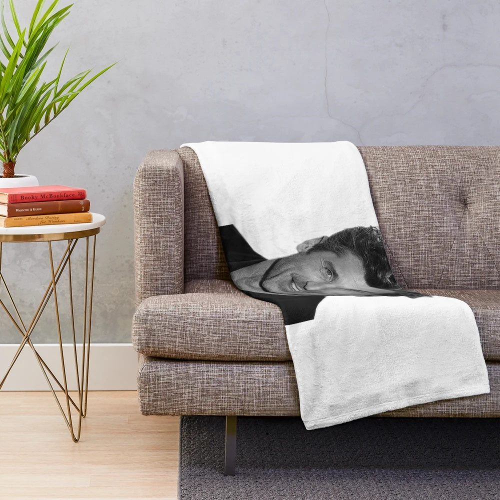 Patrick Dempsey as Derek Shepherd on a plush blanket