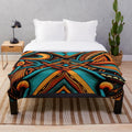 Cozy patterned plush blanket with motifs inspired by African culture