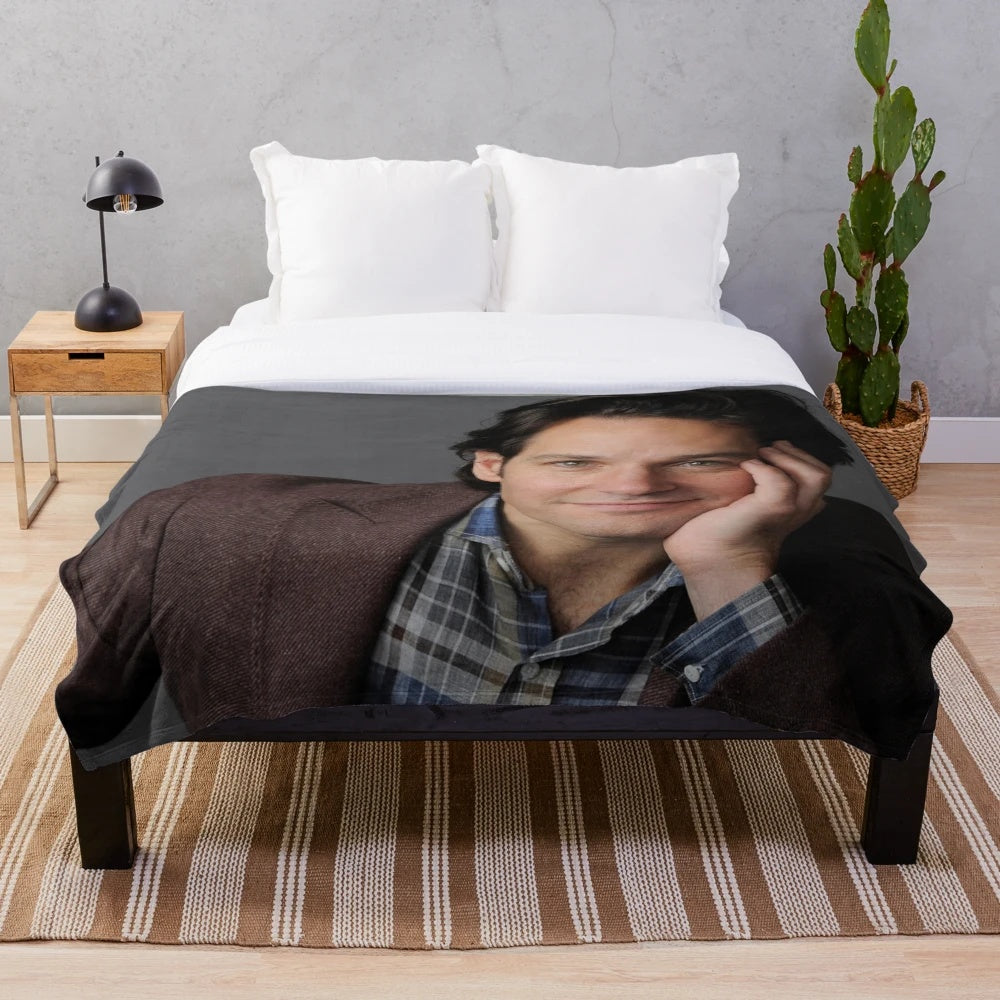 Soft, plush blanket featuring a design inspired by the Marvel actor Paul Rudd