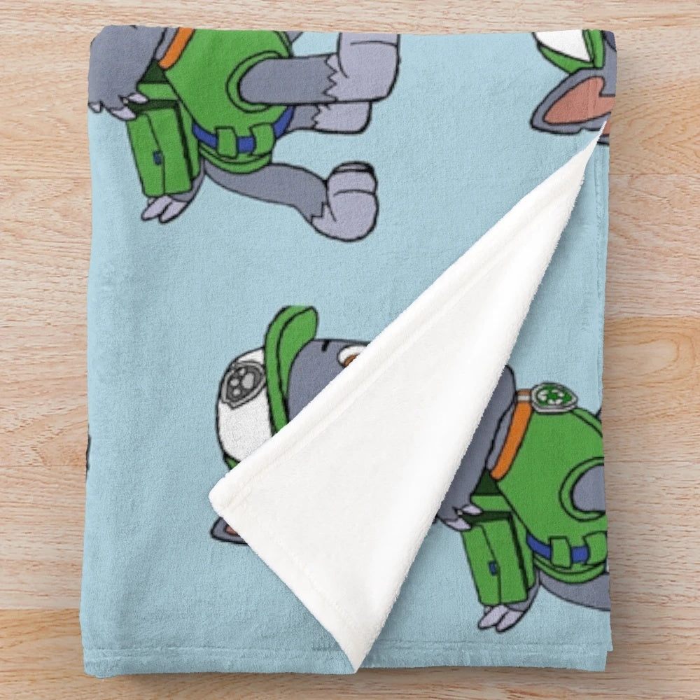 Soft and cozy plush blanket featuring the Paw Patrol character Rocky