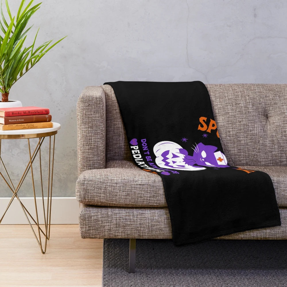 Pediatric nurse plush blanket with spooky and cute design